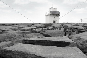burren lighthouse on rocks