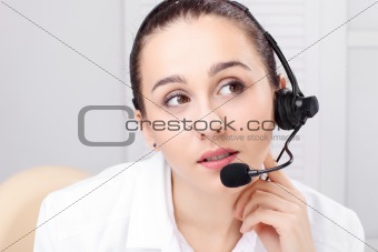 woman with headset over white background