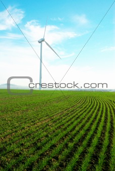 Wind turbine against a blue sky