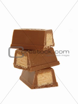 Pyramid of chocolate isolated on white background 