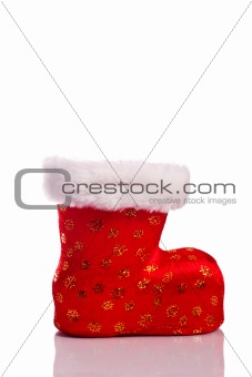 Empty red santa shoe isolated over white