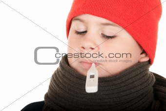 Boy takes temperature thermometer