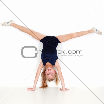 Girl child performing gymnastics