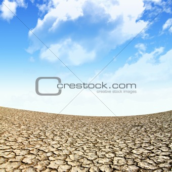 Large field of baked earth after a long drought 
