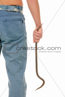 Teenager holds curve piece of iron