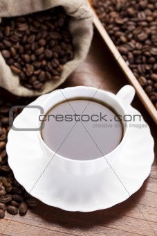 Caffee cup and beans