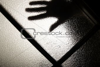 hand behind the glass   