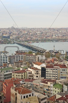 Cityscape over a river with road bridge