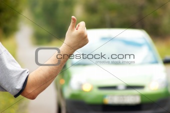Man hitching on road