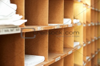 Bookshelf with papers in documents archive