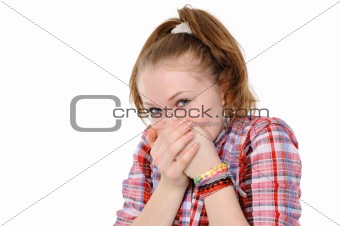 teenage girl with hand over mouth 