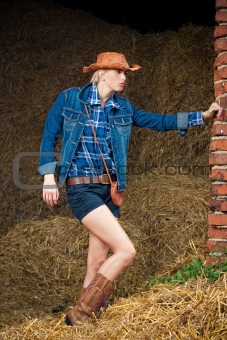 attractive cowboy girl in village