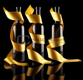 Gold ribbons aroun bottles