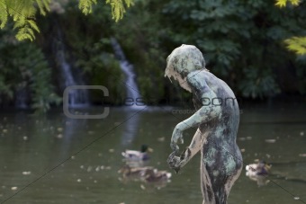 Statue in the water