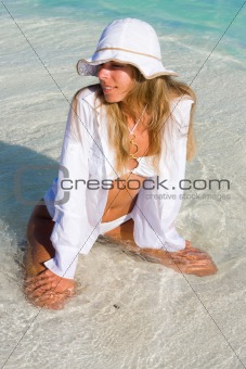 Lady in a bikini on a tropical beach
