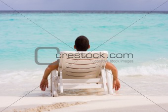 Men at a tropical beach