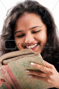 Indian girl enjoing reading book