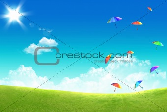 Multicolor umbrella floating in the sky