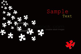 white puzzle pieces scattered on black background 

