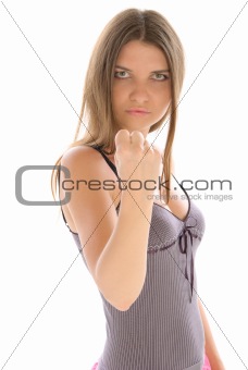 Young woman shakes fist