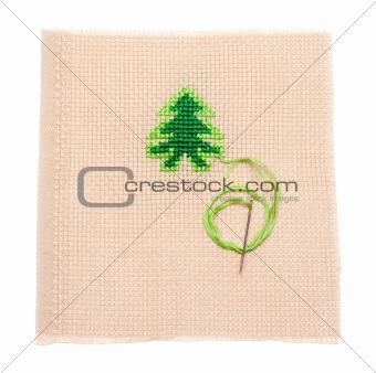 Green spruce on fabrics, needle