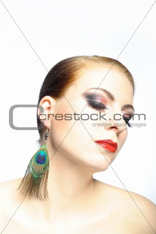 Young beauty female face with red shiny lips