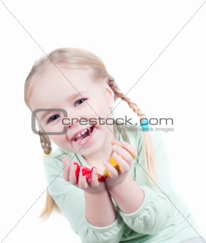 Little girl playing with colors