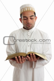 Man reading a religious or other book