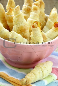 mini croissants in a pink bowl
