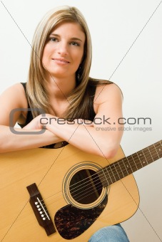 Women with accoustic guitar