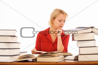 Woman reading with large books
