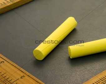 Yellow Chalk on Writing Slate