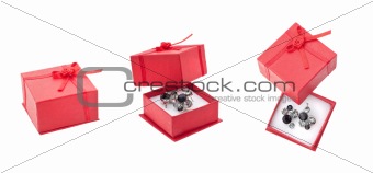 Red present box and earrings