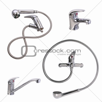 A set of sanitary taps and shower heads, closeup, isolated on wh
