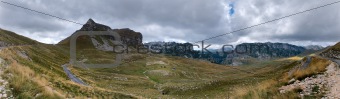 Valley in mountains. Panoramic image