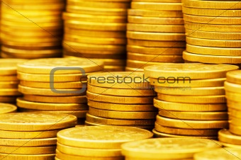 Close up of gold coin stacks - shallow DOF