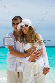 Happy young couple on a beach