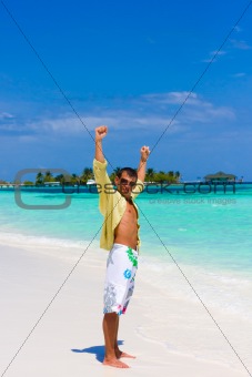 young man on a tropical beach