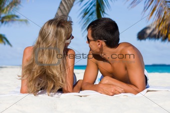 young couple on a tropical beach