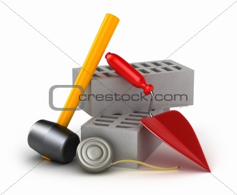 Building tools : hammer trowel and brick. Isolated on white.
