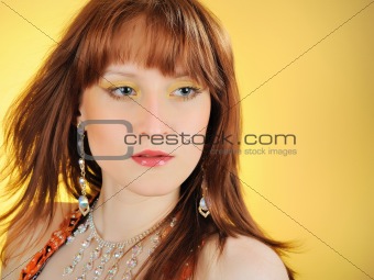Beautiful mystic woman with golden make-up