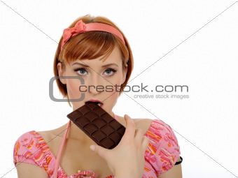 beautiful woman eating chocolate bar. isolated on white