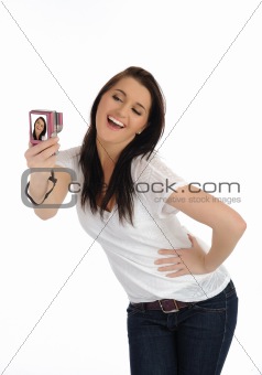 beautiful casual woman taking photos on a digital camera