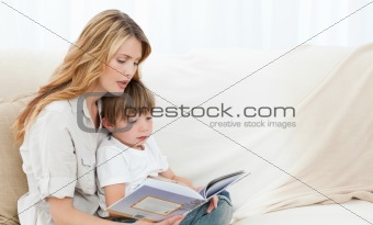 Mother reading with her son