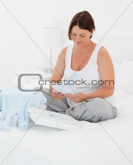 Woman with childrens clothes