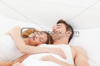 Happy couple sleeping together