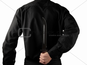 standing man in black with knife for backs