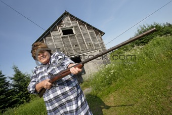 Woman with huge rifle