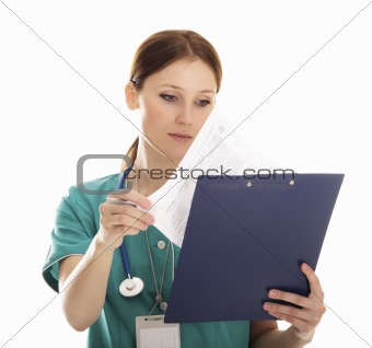 Portrait of pretty nurse with clipboard