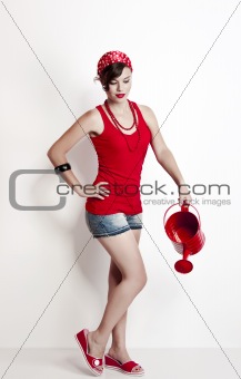 Pin-up girl with a watering can